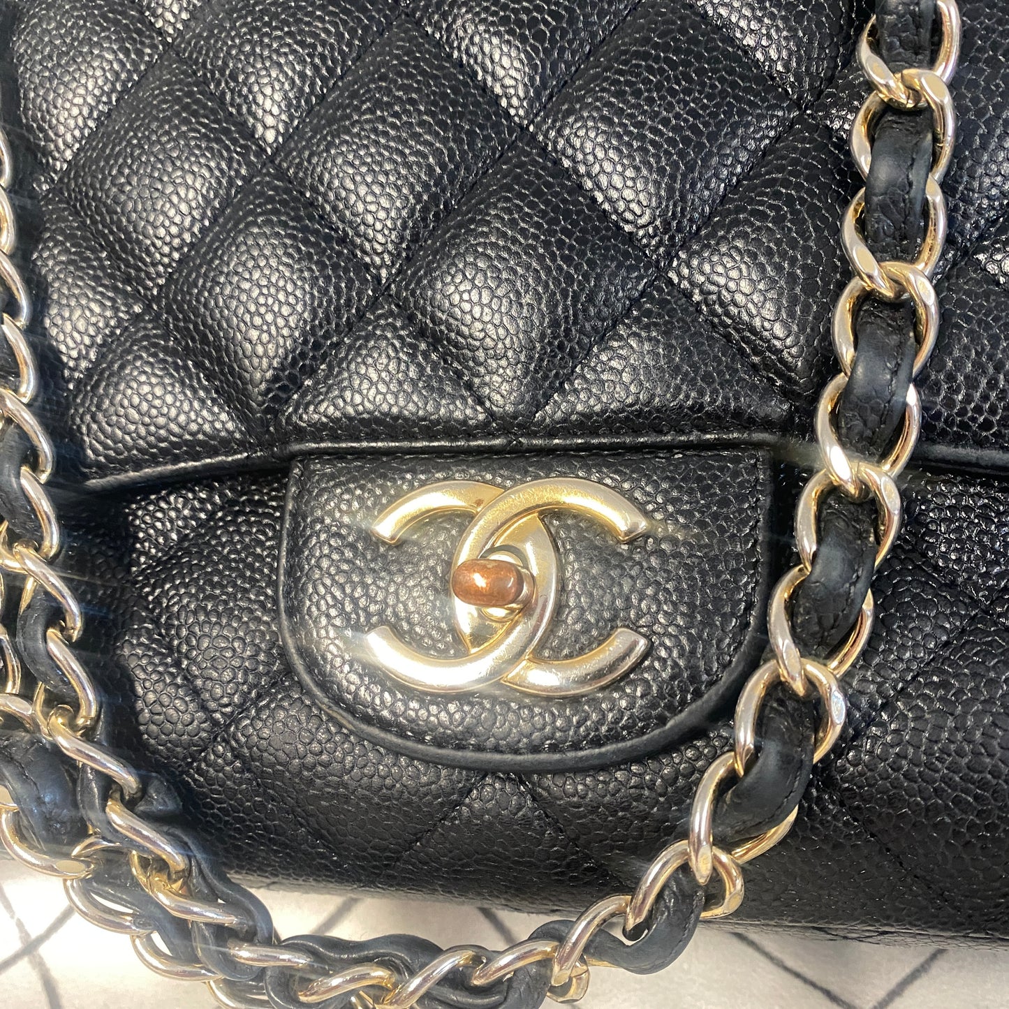 chanel black leather maxi jumbo double flap bag