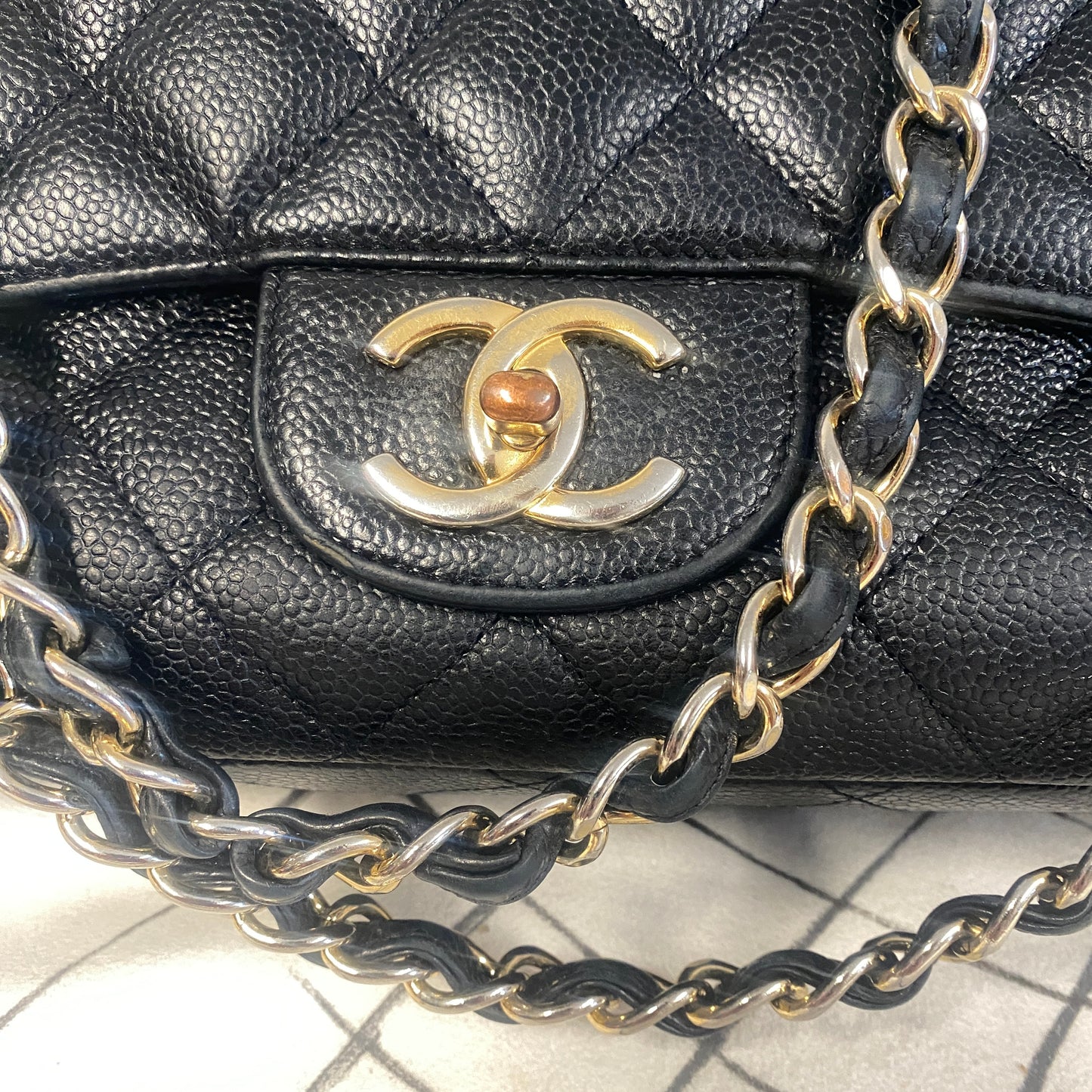 chanel black leather maxi jumbo double flap bag