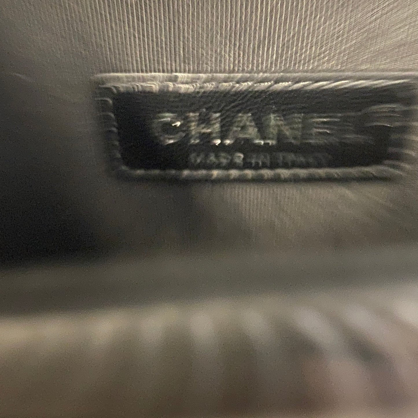 Chanel black patent leather glitter chevron boy bag