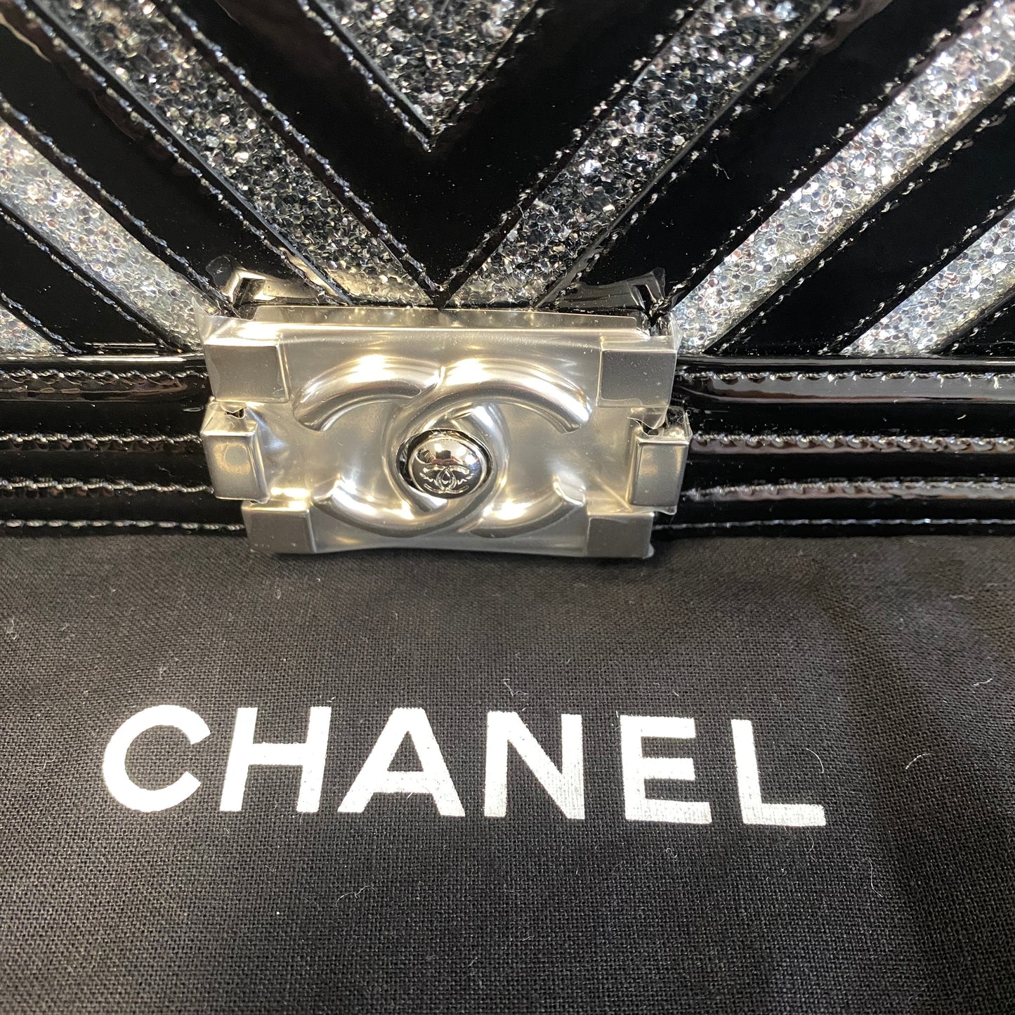 Chanel black patent leather glitter chevron boy bag