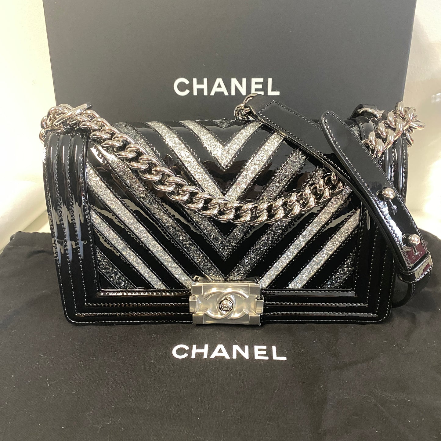 Chanel black patent leather glitter chevron boy bag