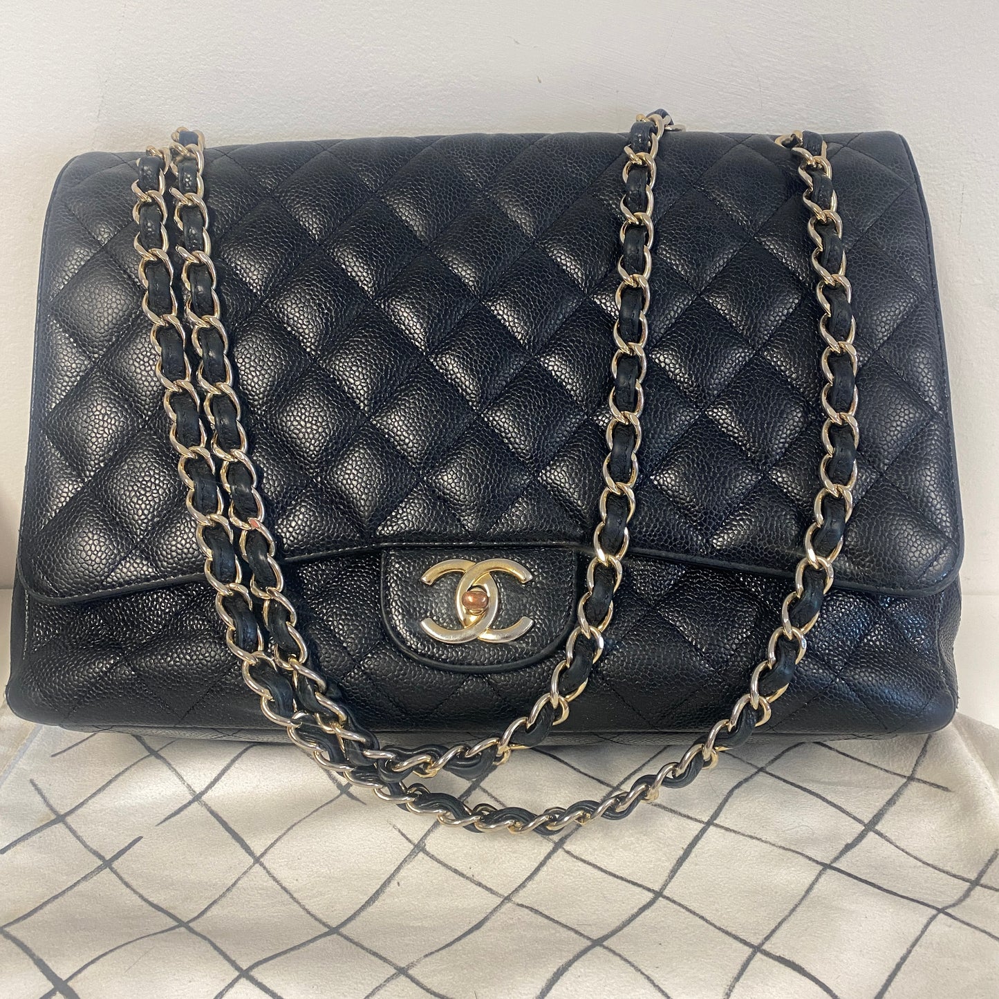 chanel black leather maxi jumbo double flap bag