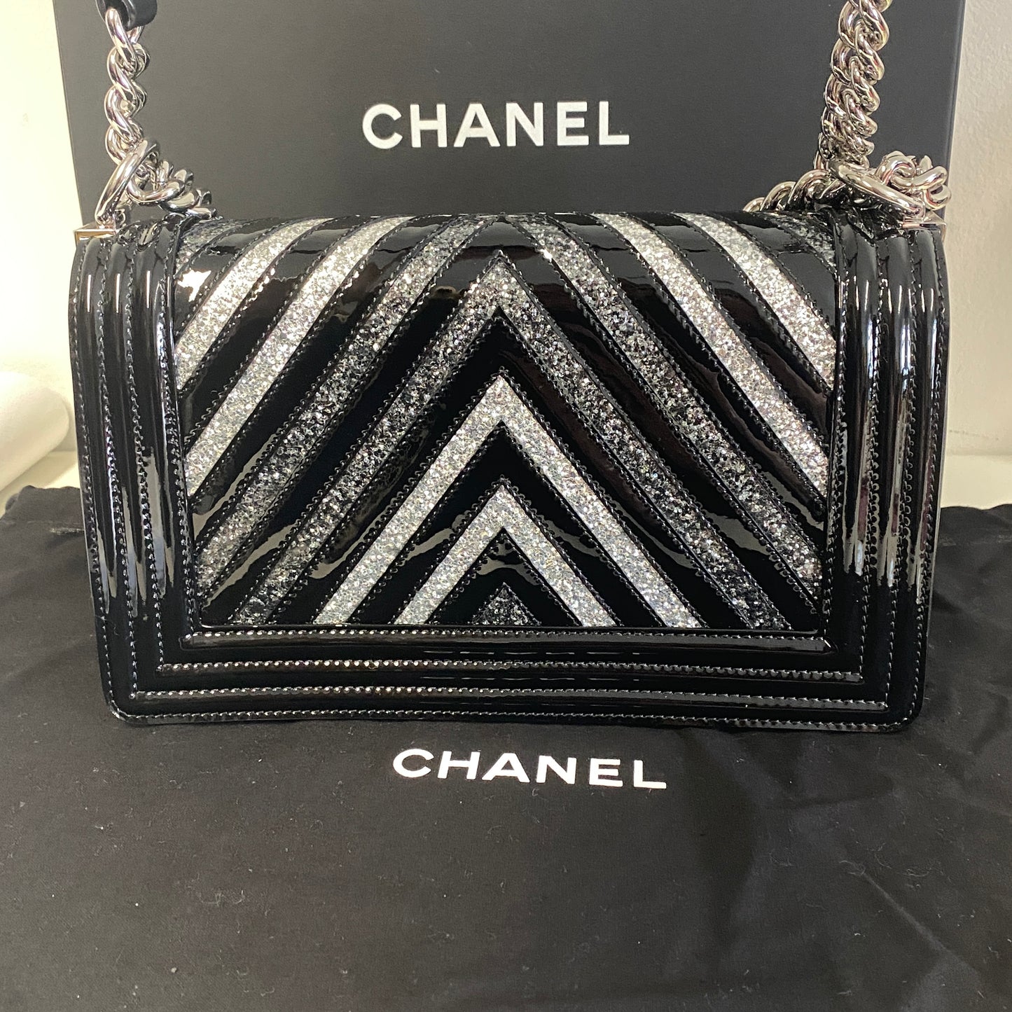 Chanel black patent leather glitter chevron boy bag