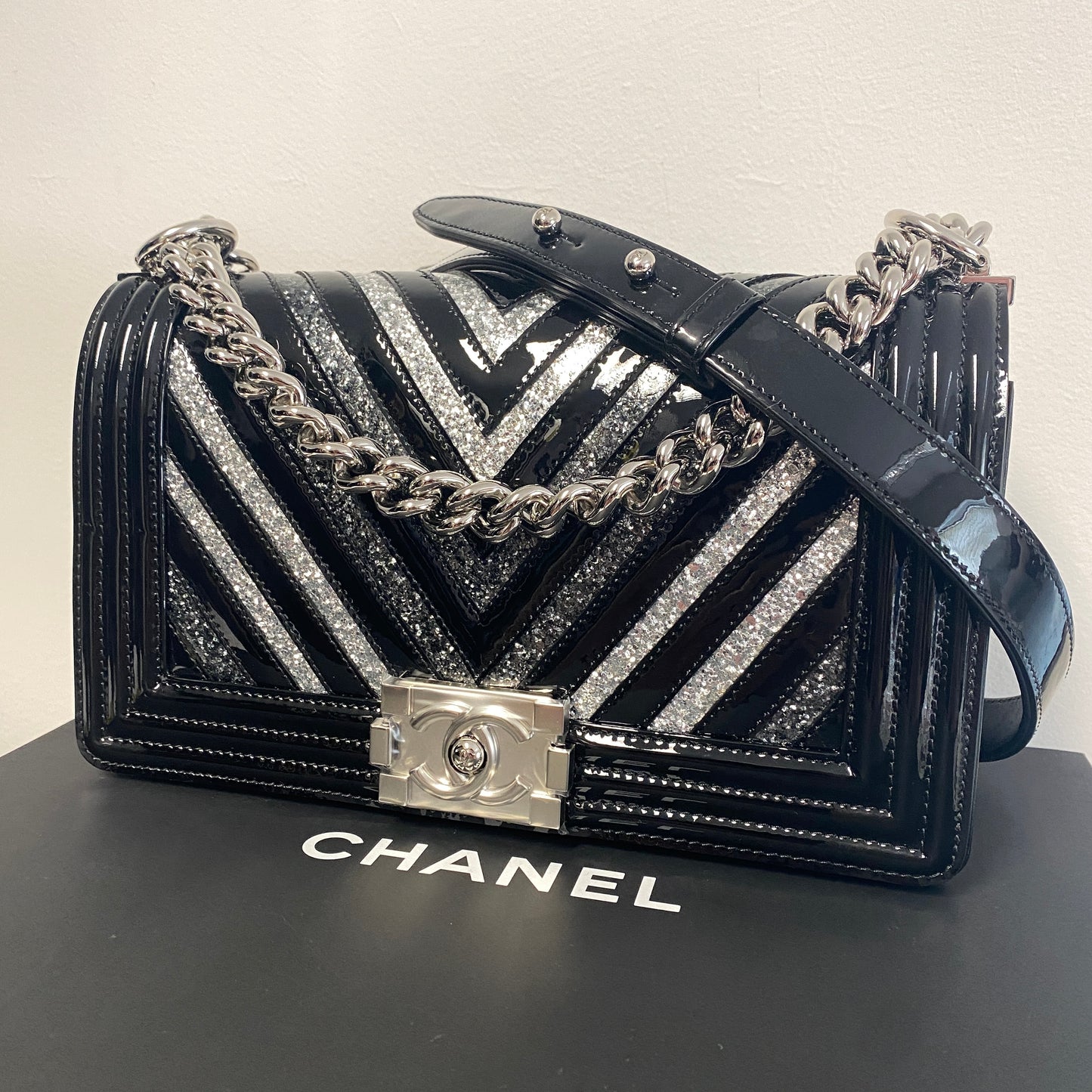 Chanel black patent leather glitter chevron boy bag