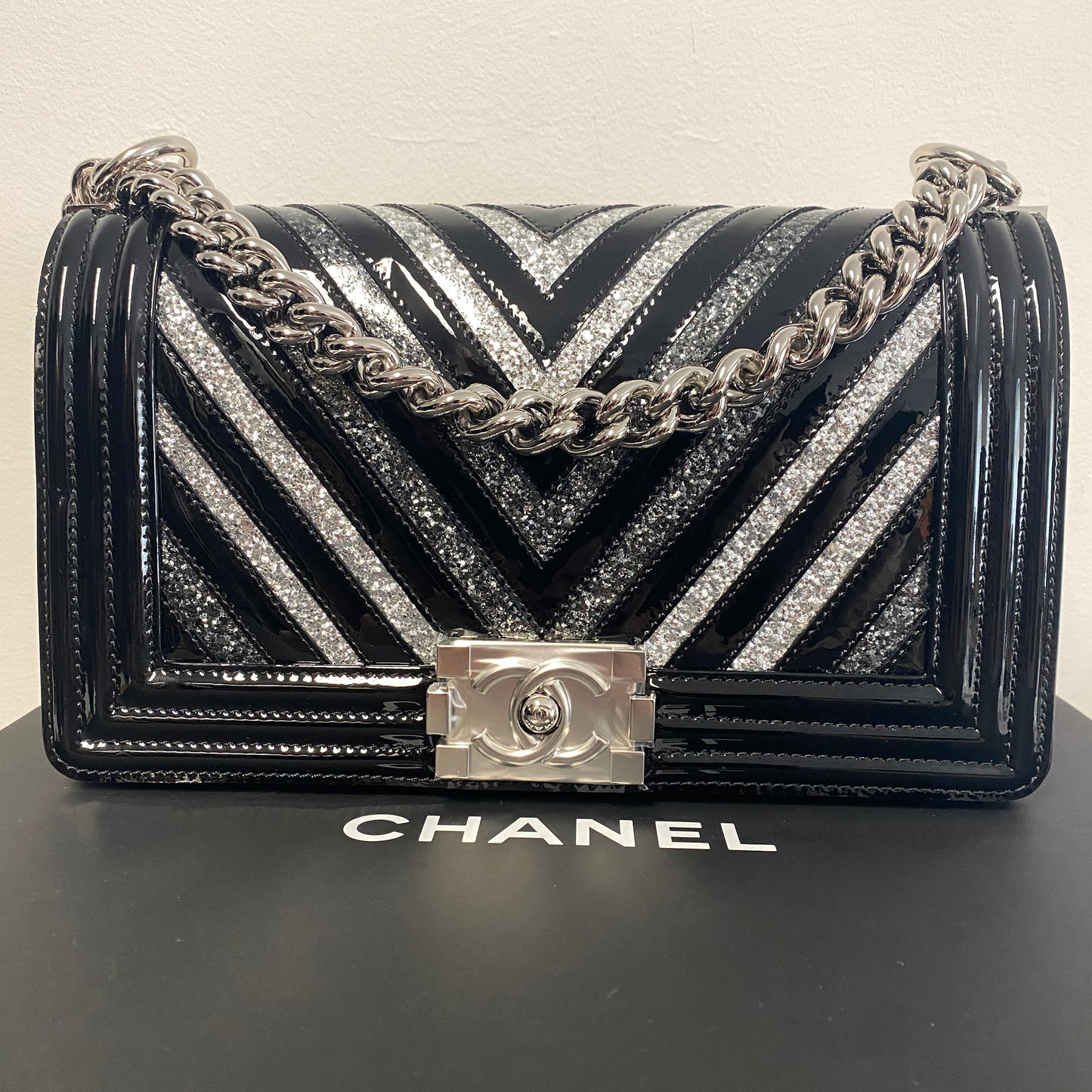 Chanel black patent leather glitter chevron boy bag