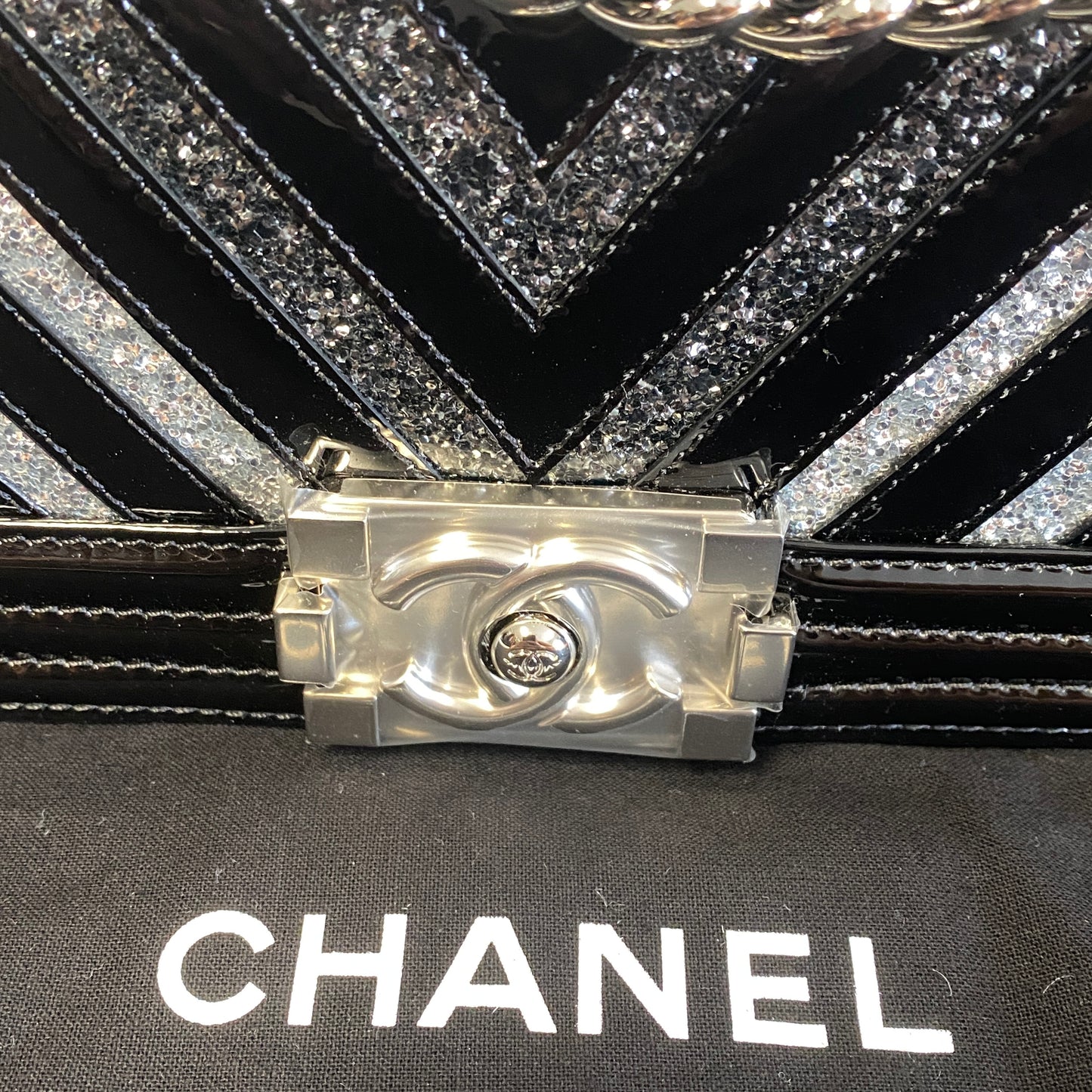 Chanel black patent leather glitter chevron boy bag