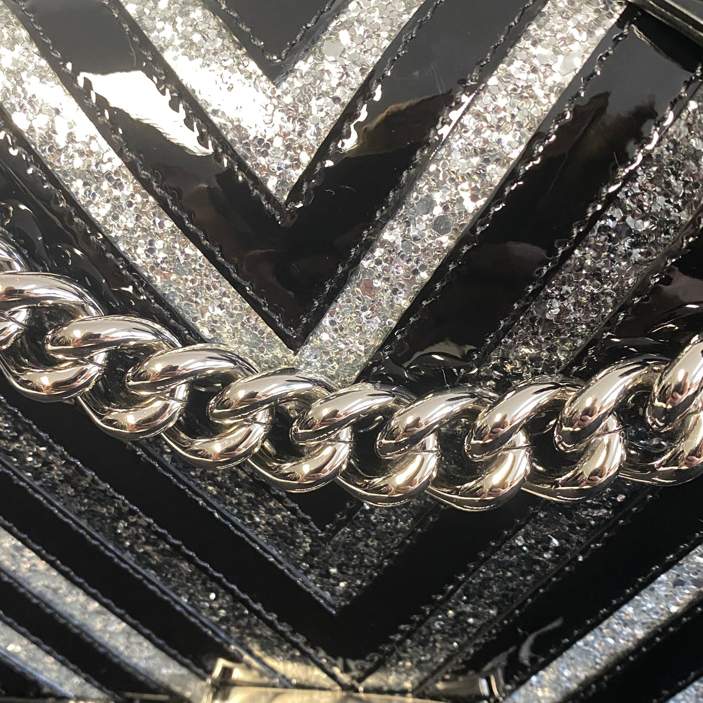 Chanel black patent leather glitter chevron boy bag